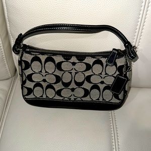 Coach signature handbags